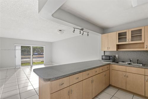 i101-7815 Camino Real, MIAMI, FL, 33143-6874 | Card Image