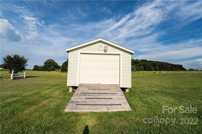 Storage Shed. Had lift door garage style with ramp. | Image 11