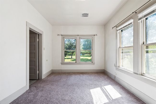 Secondary bedroom is equally bright and comfortable. | Image 18