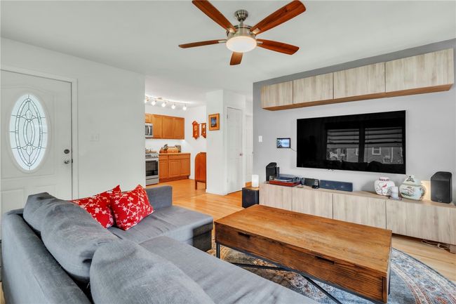 open living room with hardwood floors | Image 4