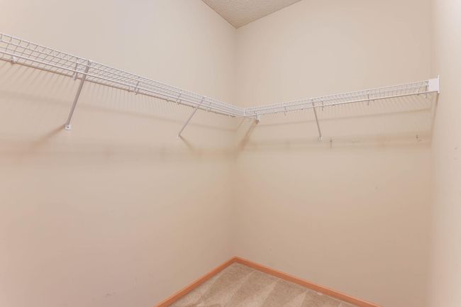 walk-in closet #1 in main bedroom | Image 21