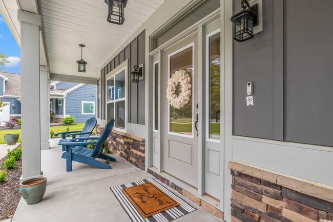 View of exterior entry with a porch | Image 6
