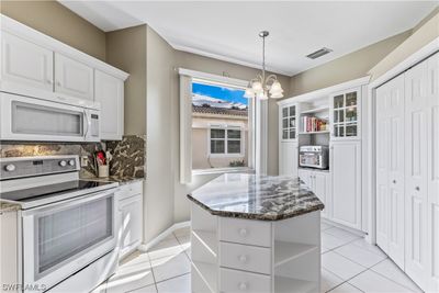 7738 Bay Lake Drive, Home with 3 bedrooms, 2 bathrooms and null parking in Fort Myers FL | Image 3