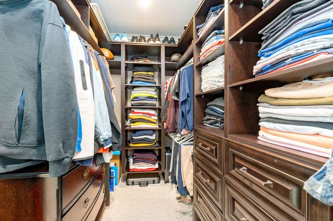 Walk in closet featuring carpet floors | Image 31