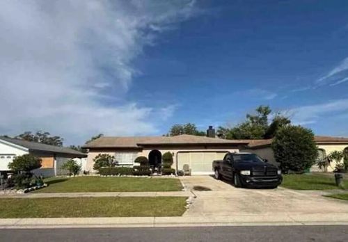 1644 E Grovehill Rd, Palm Harbor, FL, 34683-3922 | Card Image