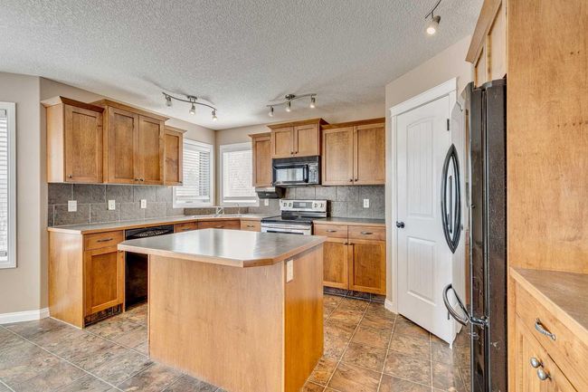 1006 Highland Green Drive Nw, House other with 5 bedrooms, 4 bathrooms and 4 parking in High River AB | Image 12