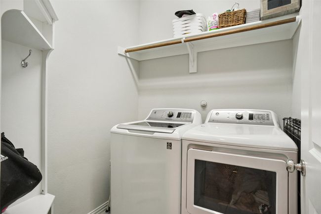 Laundry room with washer and dryer | Image 22