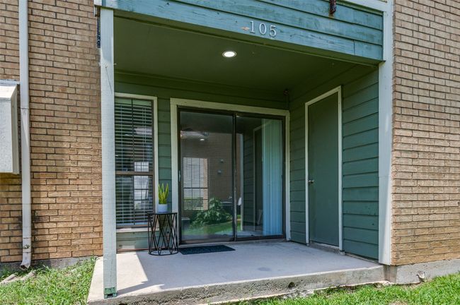 Great covered back patio with a spacious, locking storage closet. | Image 10