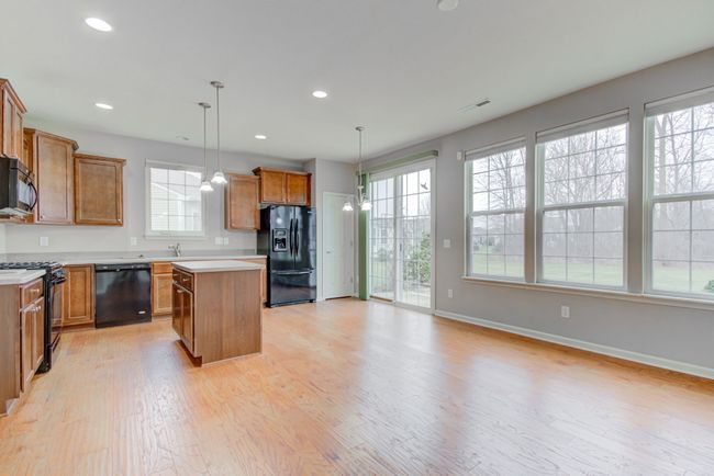 hearth / breakfast room view to kitchen | Image 19