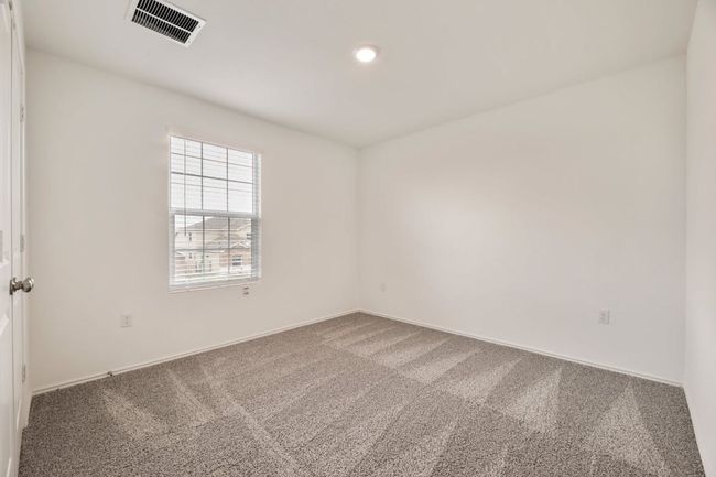 Carpeted spare room featuring baseboards and recessed lighting | Image 27