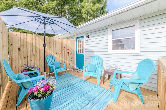 A spacious deck is perfect for outdoor entertianing or relaxation! | Image 40