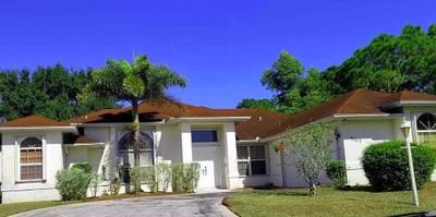 3217 Se Quay Street, House other with 3 bedrooms, 2 bathrooms and null parking in Port St Lucie FL | Image 1