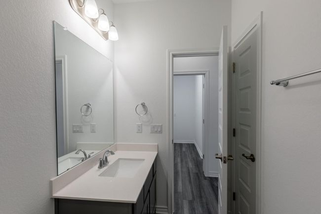 Bathroom featuring vanity and wood finished floors | Image 29