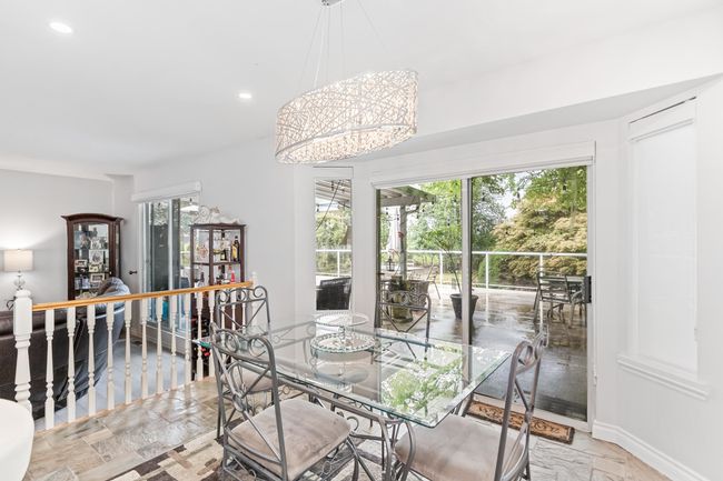 Dining room featuring recessed lighting, baseboards, and a chandelier | Image 16