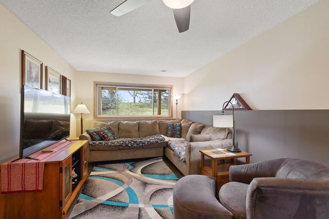 Two seperate areas in family room | Image 17