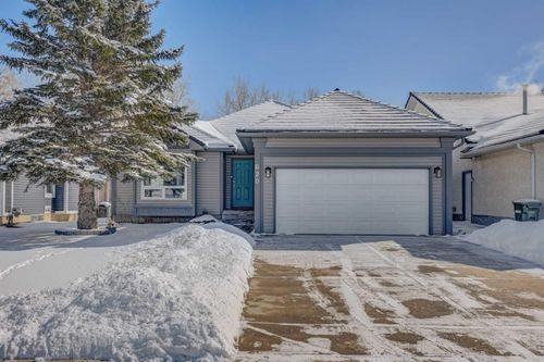 620 Woodside Drive Nw, Home with 4 bedrooms, 3 bathrooms and 4 parking in Airdrie AB | Card Image