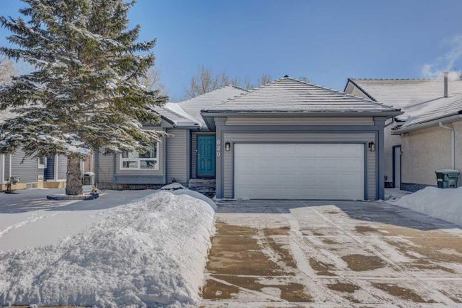 620 Woodside Drive Nw, Home with 4 bedrooms, 3 bathrooms and 4 parking in Airdrie AB | Image 1