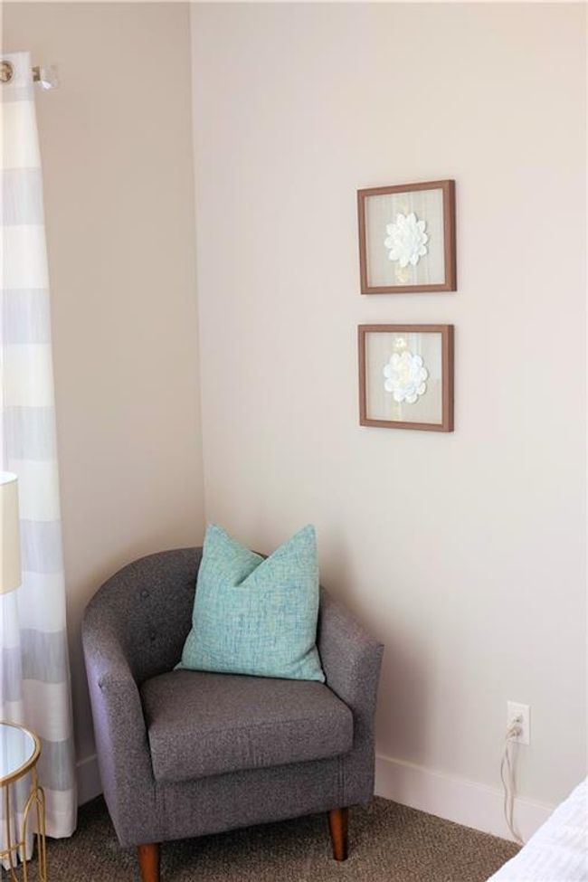 Sitting room featuring carpet flooring and baseboards | Image 31