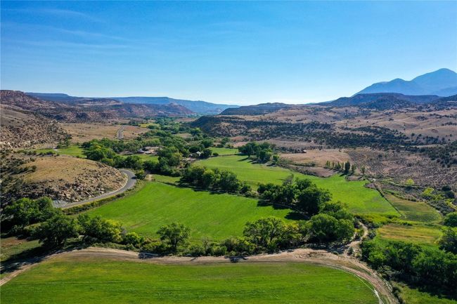Birds eye view of property with a mountain view | Image 34