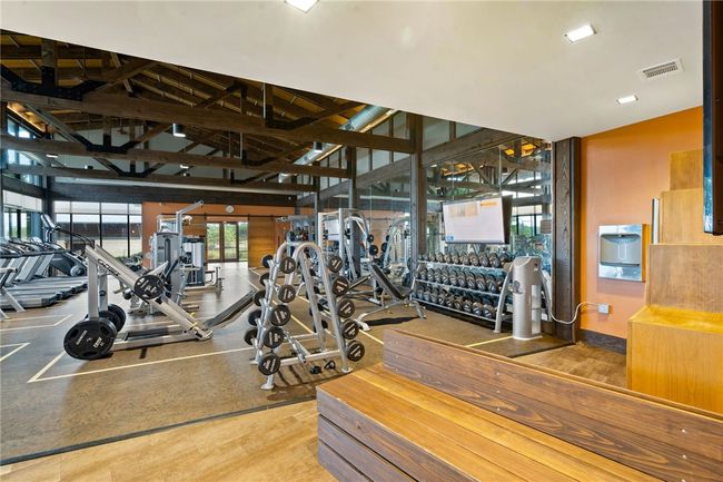 State-of-the-art fitness center for neighborhood has SO many work out options and even offers views while your work out! | Image 34