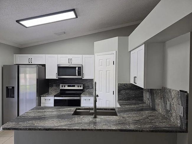 1817 Sw Leafy Rd, House other with 3 bedrooms, 2 bathrooms and null parking in Port St. Lucie FL | Image 8