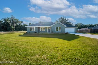 11945 Elm Street, House other with 3 bedrooms, 2 bathrooms and null parking in Brooker FL | Image 3