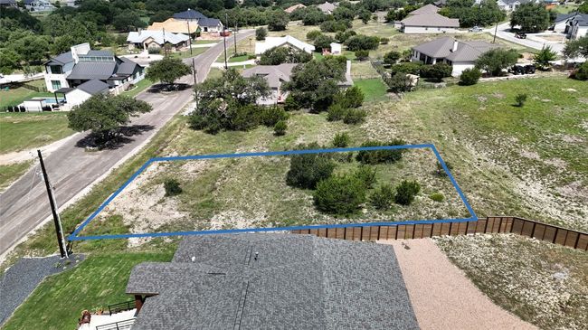 Aerial perspective of suburban area with property parcel outlined | Image 4