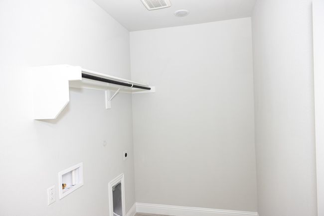 Laundry room with washer hookup and hookup for an electric dryer | Image 21