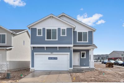 View of front of property with a garage | Image 1