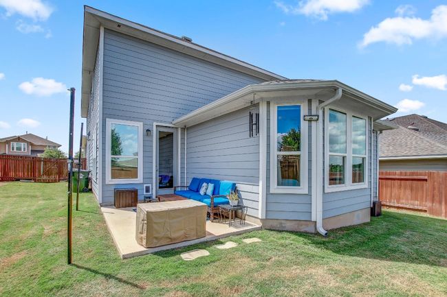 Back of house featuring a patio, a fenced backyard, and outdoor lounge area | Image 38