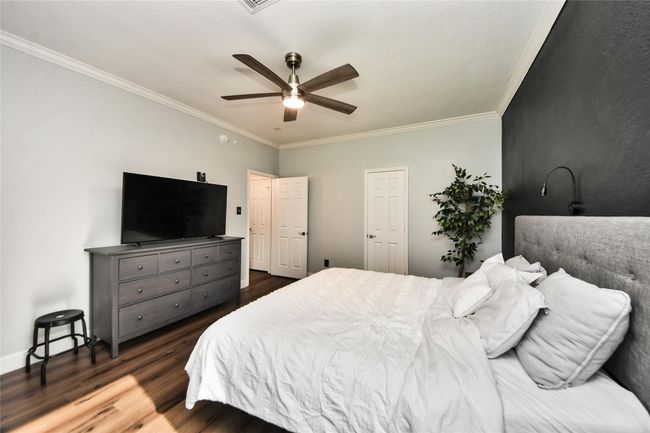 No carpet and a ceiling fan for added comfort. | Image 16