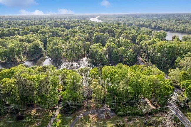 Bird's eye view featuring a view of trees and a water view | Image 46