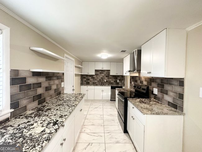 6069 Wisteria Ln, House other with 4 bedrooms, 2 bathrooms and null parking in Lithia springs GA | Image 5