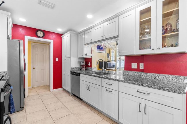 10448 Hetrick Cir W, House other with 3 bedrooms, 2 bathrooms and null parking in Largo FL | Image 8