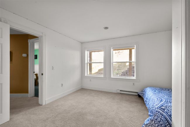 Bedroom featuring carpet flooring | Image 25