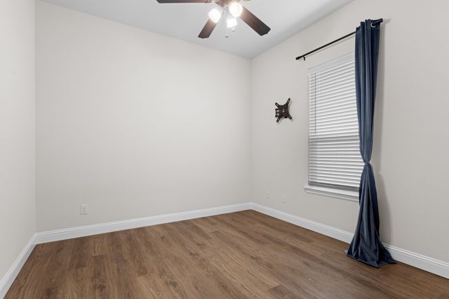 Bedroom 2 at the front of the home. | Image 34