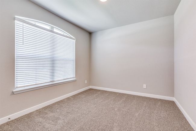 Unfurnished room with a healthy amount of sunlight and carpet | Image 13