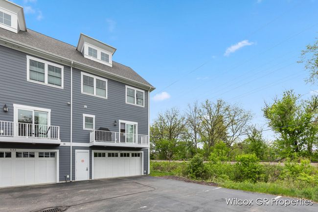 Attached 2 car garage with easy access to the lower level finished walkout area. | Image 39