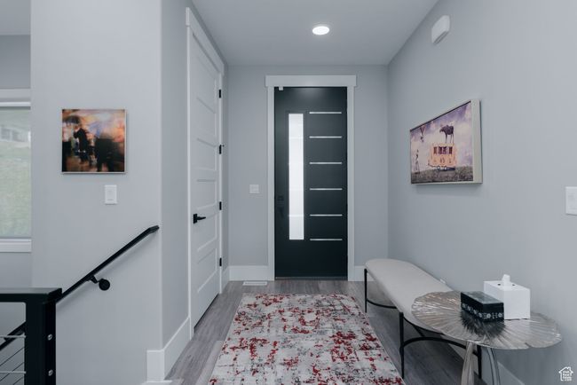 Foyer with wood finished floors, baseboards, and recessed lighting | Image 25