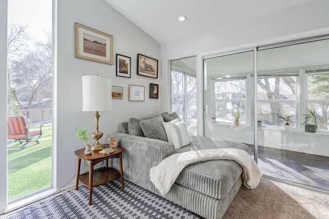 Upstairs family room with sunroom and patio access | Image 25