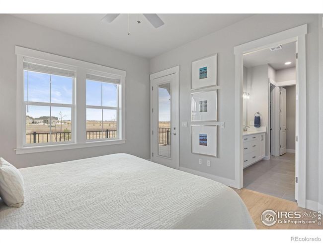 Primary Bedroom leads to Patio and Bathroom Suite | Image 13