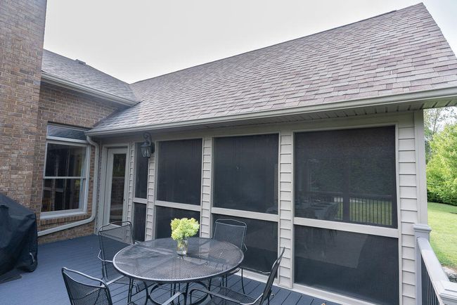 Grilling deck looking back toward screened-in porch. | Image 92