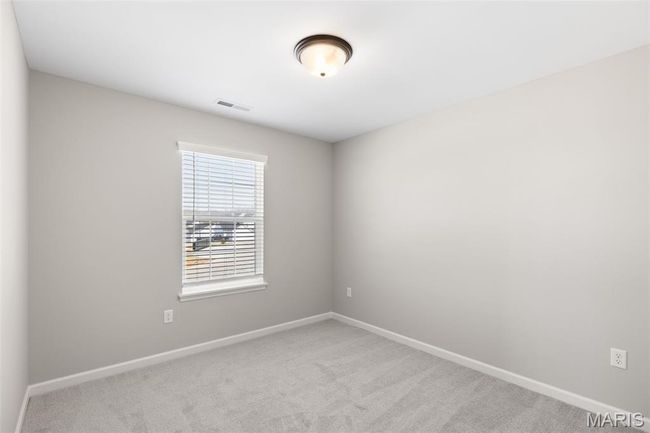 Carpeted empty room with baseboards | Image 16