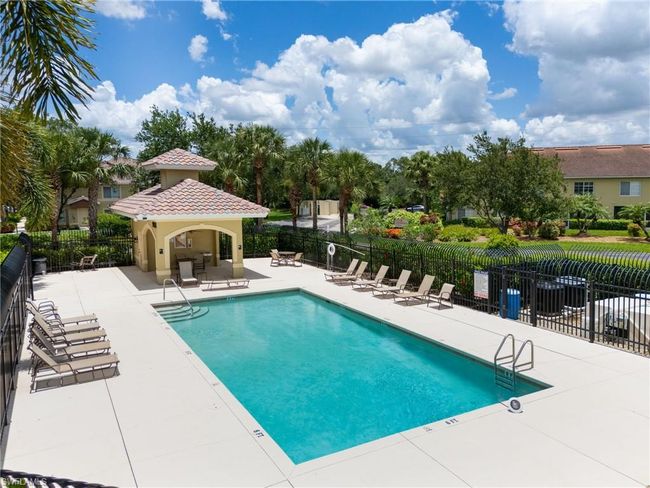 Community pool featuring a patio area | Image 15