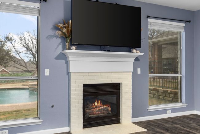 Details with hardwood / wood-style flooring and a fireplace | Image 12