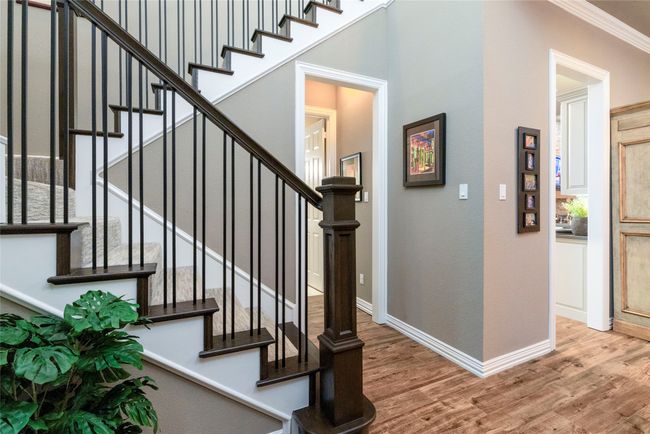 Stairs featuring lovely wrought iron balusters | Image 26