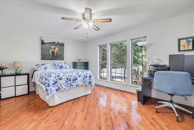 Bedroom 4 is located upstairs. | Image 26