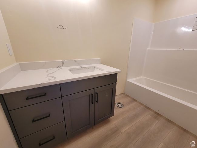 This full bathroom services 3 secondary bedrooms upstairs. | Image 10