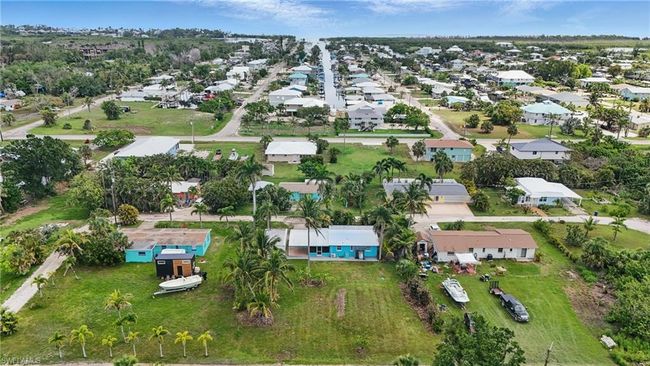 Aerial overview of property's location with nearby suburban area | Image 41