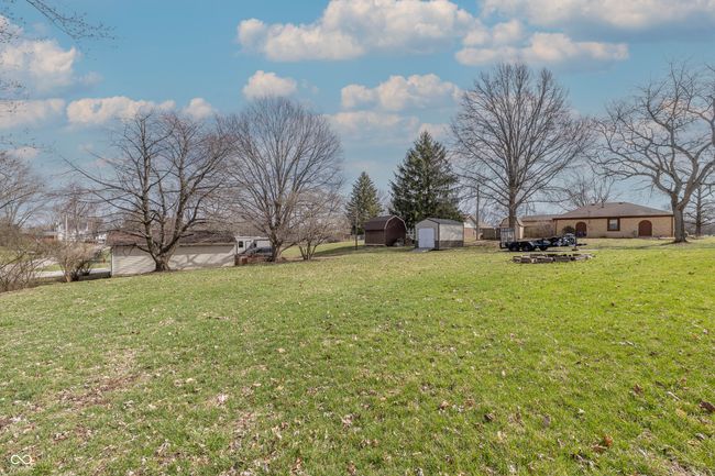 view of yard featuring an outbuilding and a shed | Image 21